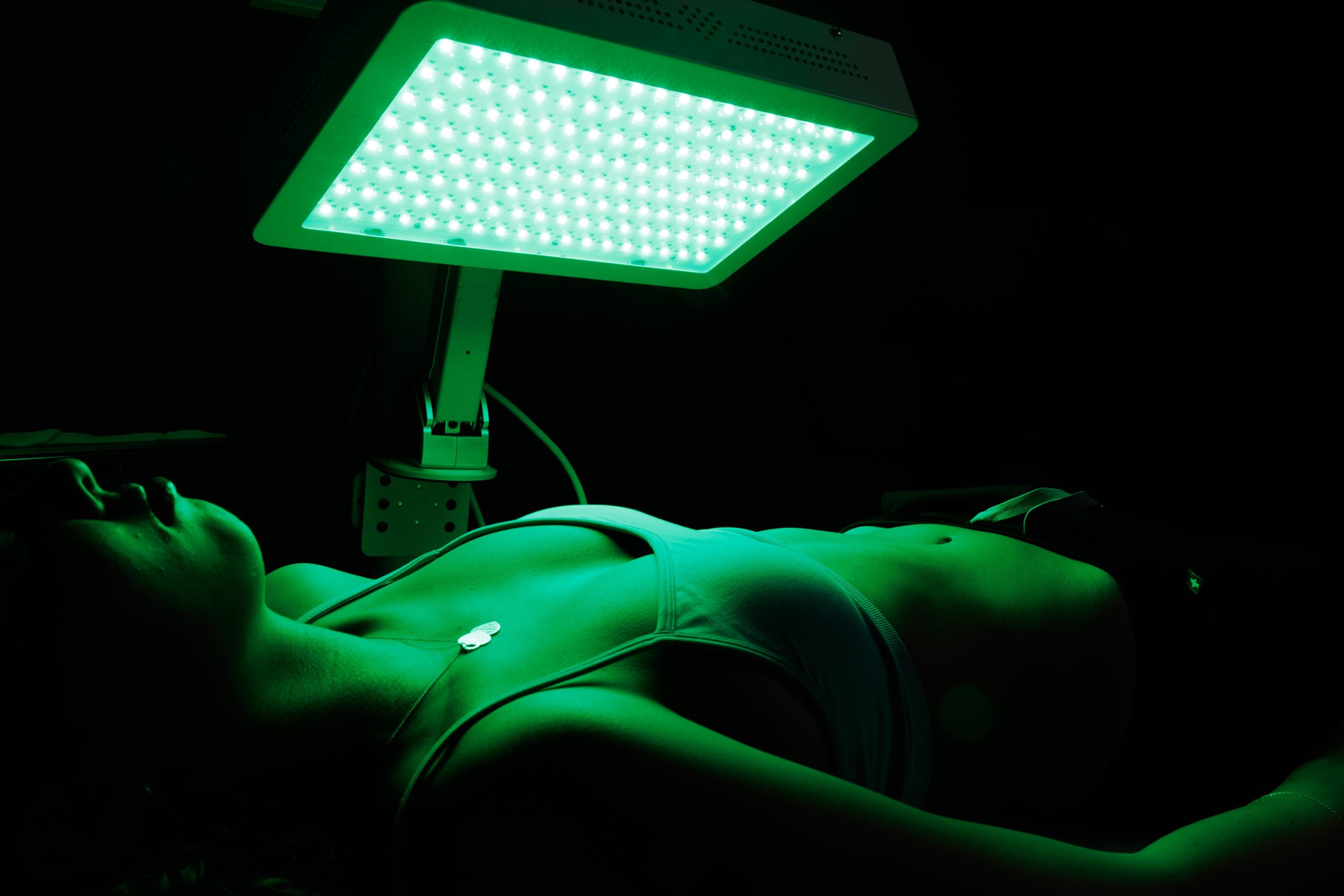 Women undergoing Green Light Therapy UltraSmooth™ | APEX Performance & Aesthetics in Sandy, UT