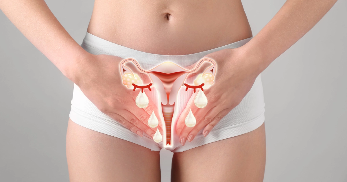 Female reproductive system illustration with tears over the abdomen, symbolizing pelvic pain, for O-Shot in Sandy, UT.
